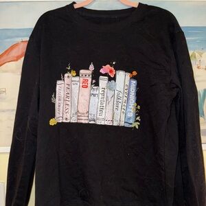 T.S. Black Sweatshirt with “The Eras” Book Spine Design